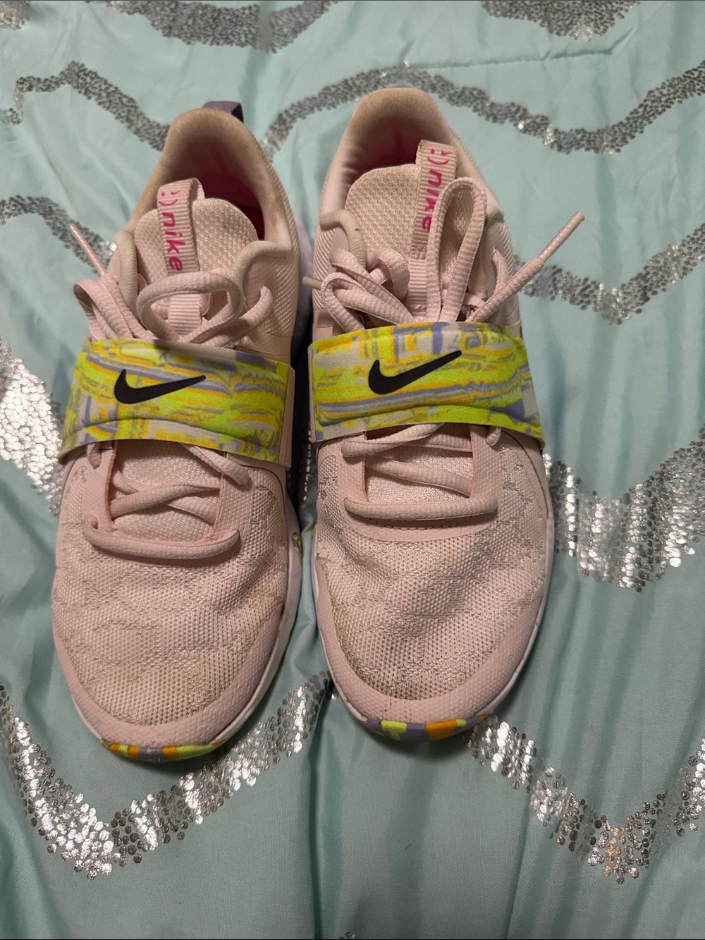 Nike Women’s Pink Sneakers with Green and Purple Accent Strap